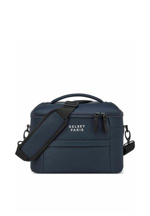 Sac de transport souple compact bleu marine avec poignée supérieure, bandoulière rembourrée réglable, fermeture à double zip et logo "Delsey Paris" sur le devant.