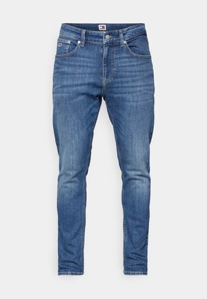 Blauwe spijkerbroeken met een slim fit, voorzien van vijf zakken, een sluiting met een knop aan de voorkant en subtiele vervaging op de bovenbenen. Standaard riemlussen inbegrepen.