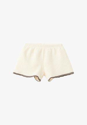 Shorts en maille couleur crème avec une taille élastique et un bord festonné foncé le long des ouvertures des jambes.