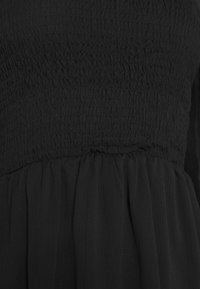 Trendyol Cocktailklänning - black