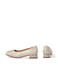 Beige patent leather ballet flats with a small gold-accented heel and a coordinating decorative bow on the toe. Smooth texture.