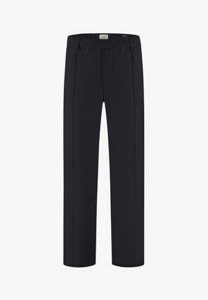 Marineblå bukser med avslappet passform, med en flat front og elastisk linning. Materialet er glatt med en subtil tekstur.
