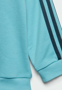 adidas Performance JOG SET - Tuta - light aqua   arctic night