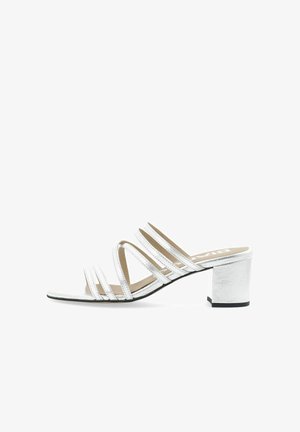 Silver heeled sandal featuring three horizontal straps across the vamp, a square open toe, and a block heel with a textured finish.
