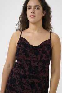 Burgundy floral-patterned dress with thin straps, draped neckline, and fitted silhouette. Fabric has a soft, textured appearance.