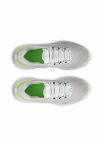 White running shoes with green accents, a textured upper, and flat laces. Features a cushioned insole and a sleek, streamlined design.