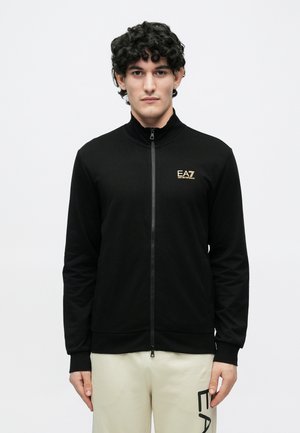 TRAIN CORE - Jaka ar rāvējslēdzēju - black/gold-coloured