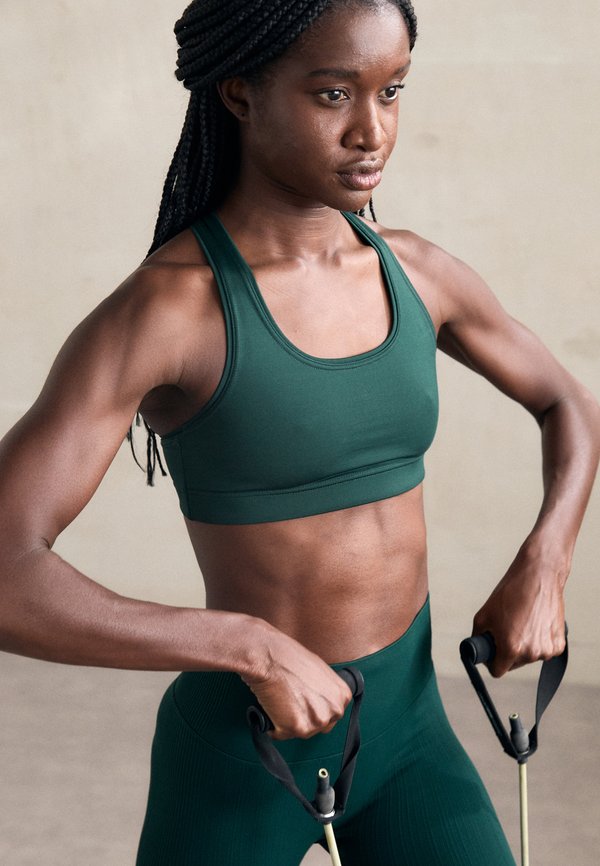 ICONIC BRA - Medium support sports bra - dark pine