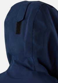 Navy blue hooded jacket with a smooth texture, featuring a Velcro tab on the back, and seam detailing along the edges.