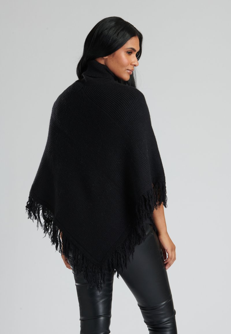 Dames poncho met imitatiebont zwart /Beige een maat L/XL Dames poncho met imitatiebont zwart /Beige een maat L/XL
