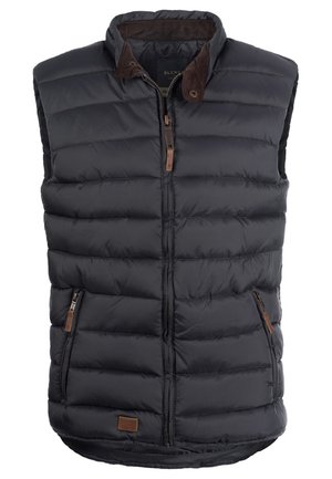 Juodas pūkinis liemenė su užtrauktuku priekyje, dviem šoninėmis kišenėmis ir rudos odos akcentais ant apykaklės ir kišenės užtrauktukų. Siuvinėta medžiaga.