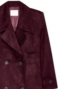 Burgundia sametist topeltkinnitatud mantel koos laia krae, suurte nööbiga, klapptaskutega ja siledast voodrist. Kohandatud sobivus ja struktuurne disain.