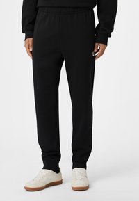 Fila BIELLA REGULAR - Verryttelyhousut - black