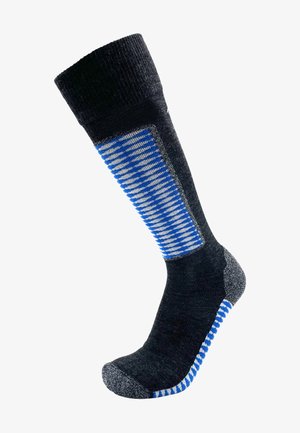 Schwarz kniehohe Socke mit einem blau und grau gestreiften Strickmuster. Verfügt über verstärkte Zehen- und Fersenpartien sowie einen strukturierten Stoff.