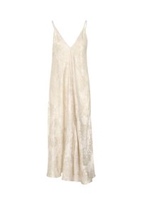 Long, sleeveless cream slip dress with thin straps and subtle shiny textured pattern on fabric.
