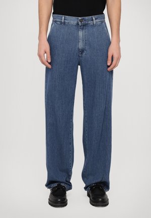 Light blue denim jeans with a loose fit, button closure, and straight legs. Material is soft with subtle fading and a classic five-pocket design.