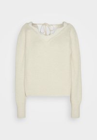 Crèmekleurige sweater met een V-hals en open rug, voorzien van gestructureerde ribbels en lange mouwen. Touwtjes aan de achterkant voor een verstelbare pasvorm.