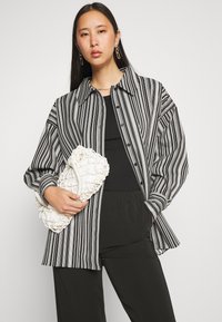Modström PERRY PANTS - Calças - black