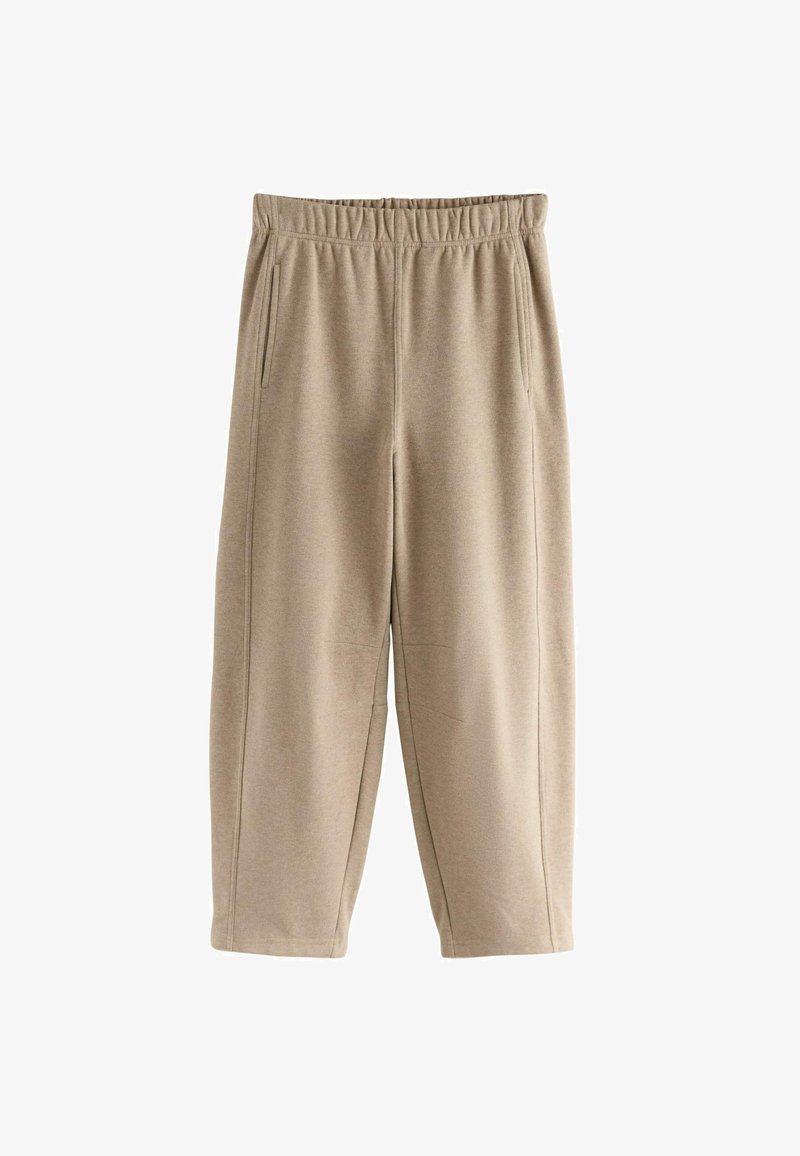 Beige sweatpants with an elastic waistband, side pockets, and a relaxed silhouette. Made from soft, textured fabric.