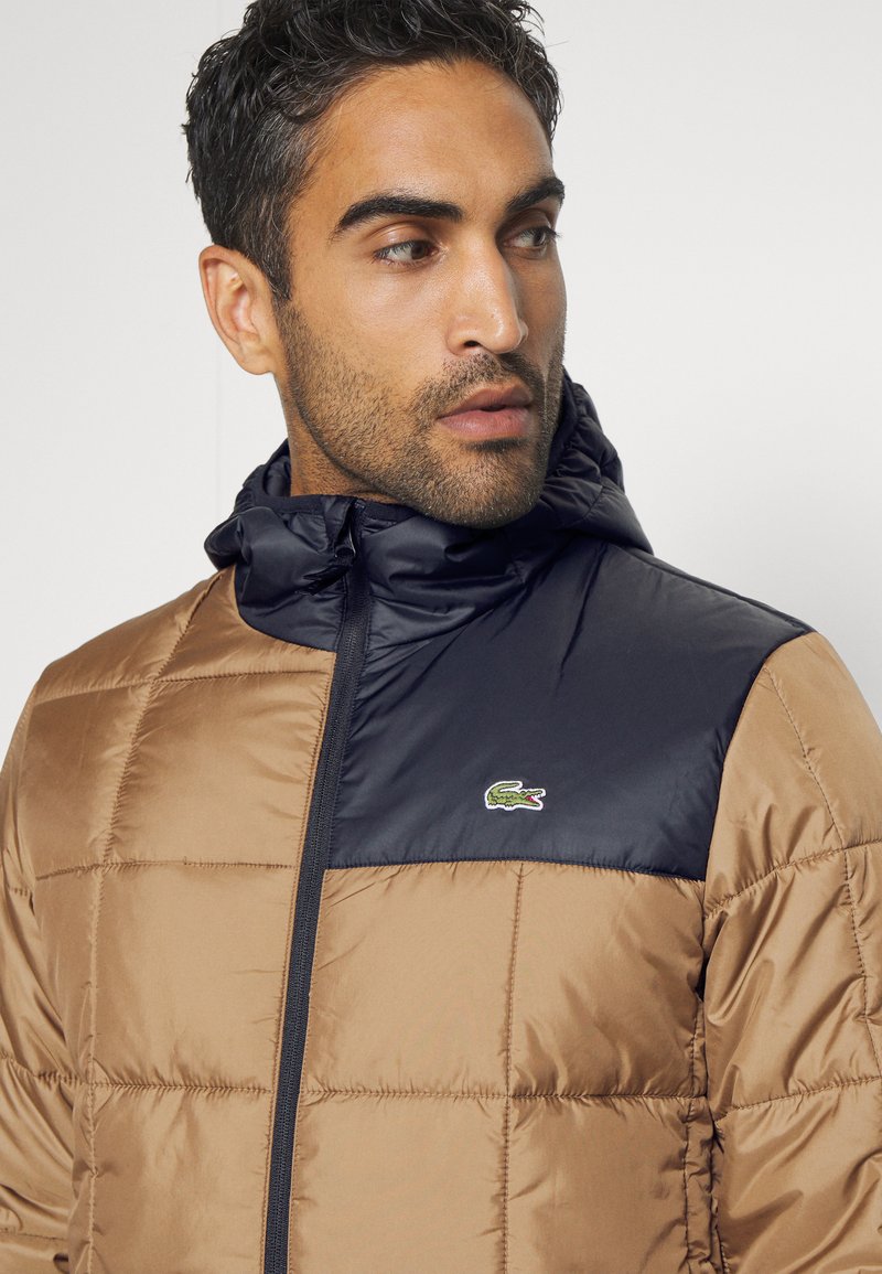 Lacoste Sport PUFFER JACKET - Winter jacket - cookie black/sand -  Zalando.co.uk