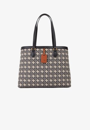 Sac cabas avec motif géométrique noir et beige, poignées en cuir noir et étiquette en cuir marron avec logo doré "V°73".