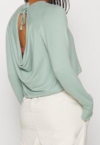 Calvin Klein Performance Pitkähihainen paita - mint