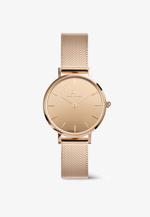 Kuldtooni kell ümarate nägudega, minimalistlike märkidega ja võrksangaga. Siledat viimistlust kellanäidikul; tekstureeritud sang ja klambri sulgur.