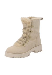 Beżowe zamszowe botki za kostkę z futerkiem, z zamkiem na sznurówki i złotymi akcentami. Posiadają masywną, żebrowaną podeszwę zapewniającą przyczepność.