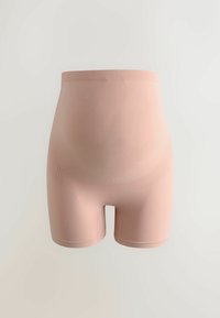 Højtaljede, sømløse former-shorts i et lyserødt, elastisk stof med en blød tekstur og længde til midt på låret. Har en bred elastikkant i taljen.