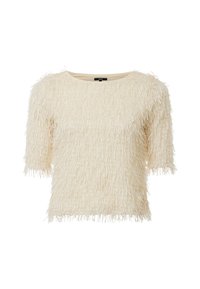 Top a maniche corte di colore crema, con una finitura testurizzata e morbida e dettagli di frangia. Collo arrotondato e vestibilità rilassata.
