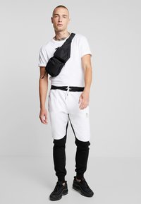 Brave Soul GLIMCO - Tracksuit bottoms - black/white