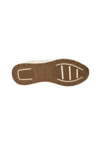Suela de zapato de goma beige con una superficie texturizada, que presenta patrones en zigzag y secciones acanaladas para mayor tracción y durabilidad.