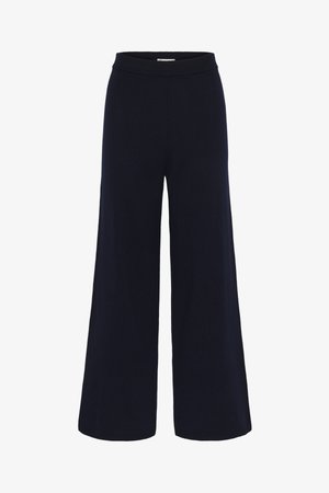 Laivastonsiniset leveälahkeiset neulehousut, joissa on joustava vyötärönauha, nilkkapituus, rento istuvuus, yksiväriset, ilman kuvioita tai koristuksia.