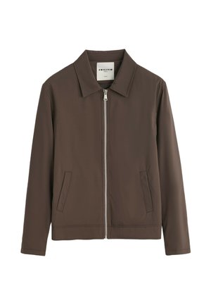 Veste marron pour homme avec col, fermeture éclair devant et deux poches latérales, présentée sur fond blanc.