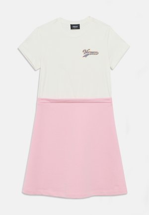 White short-sleeve dress featuring a pink skirt. The top has a logo with sparkly detailing. Smooth fabric and fitted design.
