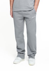 Pegador - LOGO WIDE PANTS - Spodnji deli trenirk - washed cool grey/white gum Miniaturna slika 1