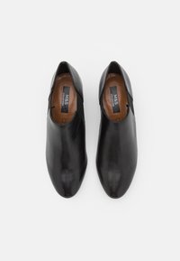 Marks & Spencer Botki