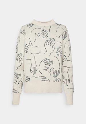 Pull blanc à manches longues avec col montant, avec un motif de mains contours noirs dans différentes positions à l'avant et sur les manches.