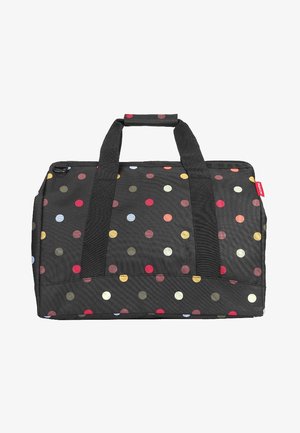 Sac en tissu noir à pois rouges, jaunes et bleus. Doté de deux poignées robustes et d'une fermeture éclair. Forme rectangulaire.