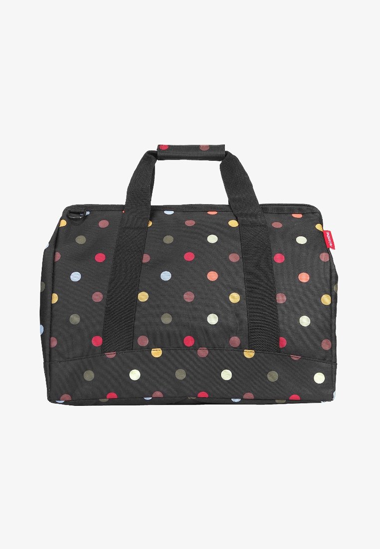 Borsa in tessuto nero con pois rossi, gialli e blu. Presenta due manici robusti e una chiusura con zip. Forma rettangolare.