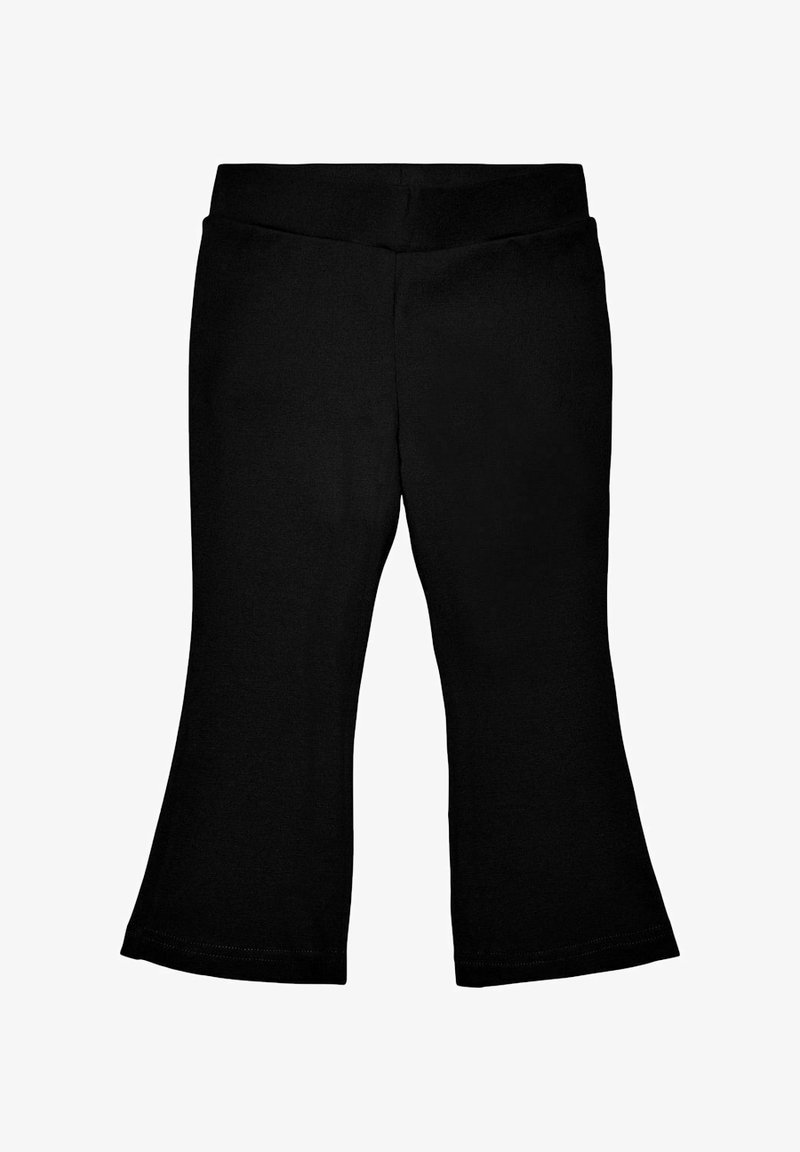 Leggings noires évasées en tissu doux et extensible. Dotés d'une taille élastique. Le design est simple, sans motifs ni accents supplémentaires.