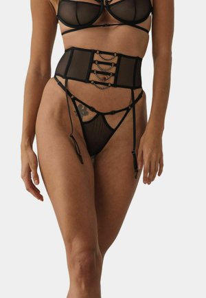 Black lingerie set featuring sheer mesh material, structured waist cincher with chain details, and adjustable straps on the thigh.