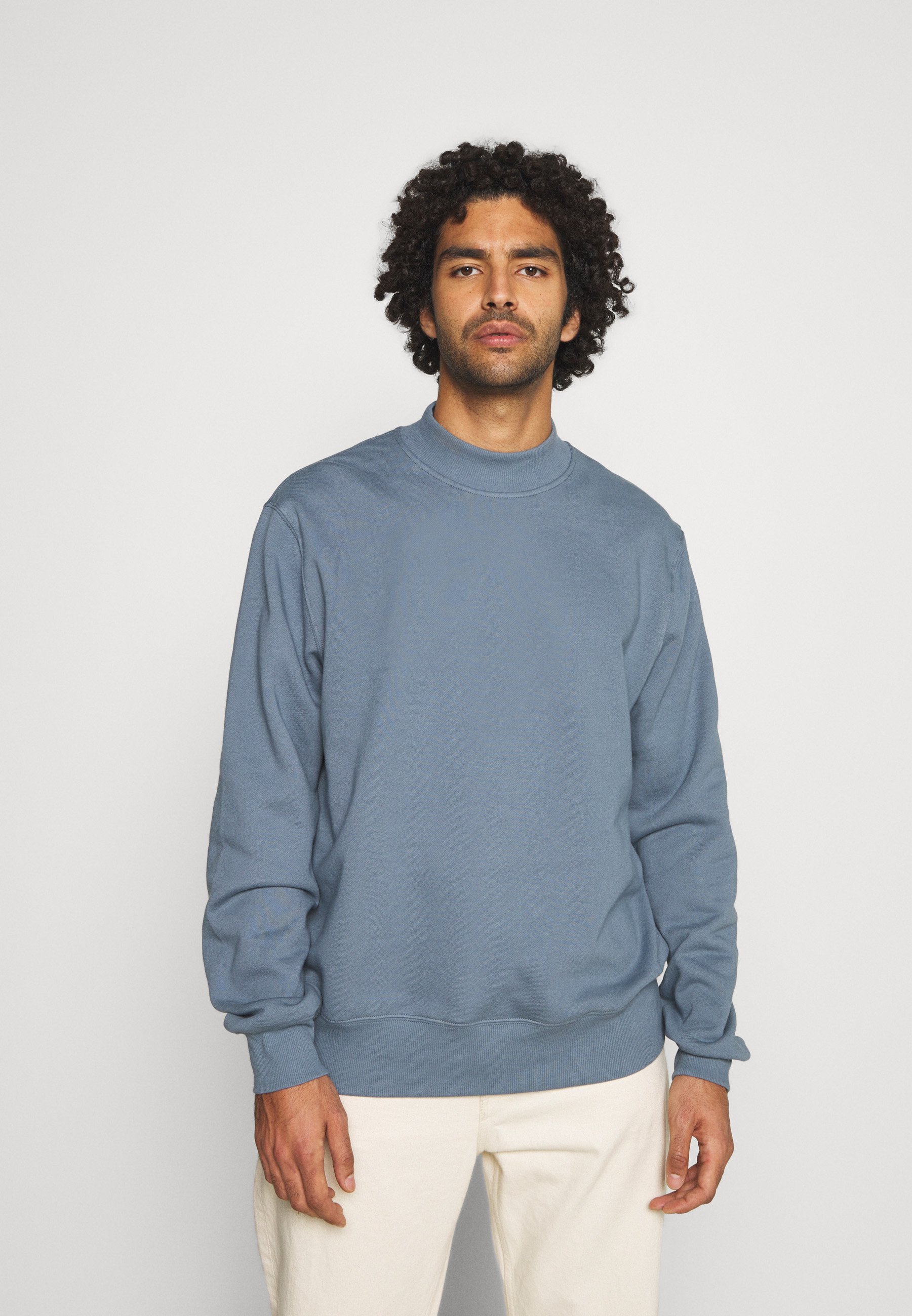 turquoise blue sweatshirt