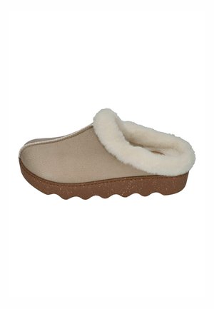 Beige slip-on slipper with a textured upper, fluffy white lining, and a brown speckled sole featuring a wavy design.