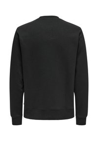 Svart sweatshirt med rund hals, långa ärmar, ribbade muddar och nederkant. Mjuk textur, minimalistisk design, inga synliga logotyper eller mönster.