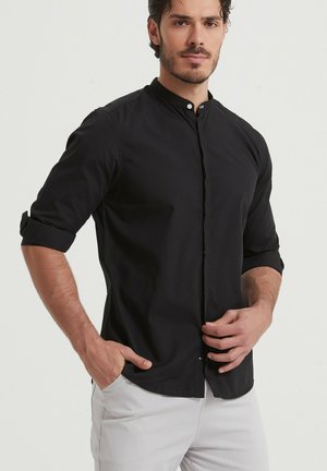 Chemises pour Hommes Galvin Green du Golf Shop Online