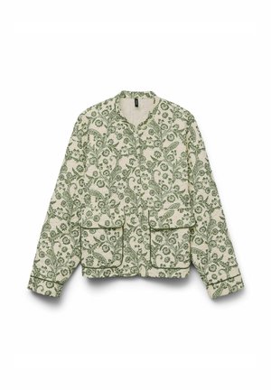 Veste crème avec motif de vigne florale verte, manches longues, deux poches avant et encolure sans col, présentée à plat sur fond blanc.