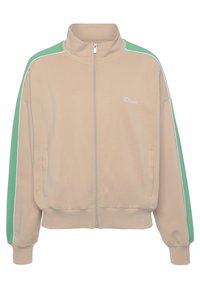 Beige zip-up jacket with a high collar, green side panels, and white accents. Ribbed cuffs and hem. Features a small logo on the chest.