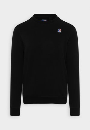 Felpa nera in misto cotone, con scollatura rotonda, maniche lunghe, polsini a costine e un piccolo logo sul petto.