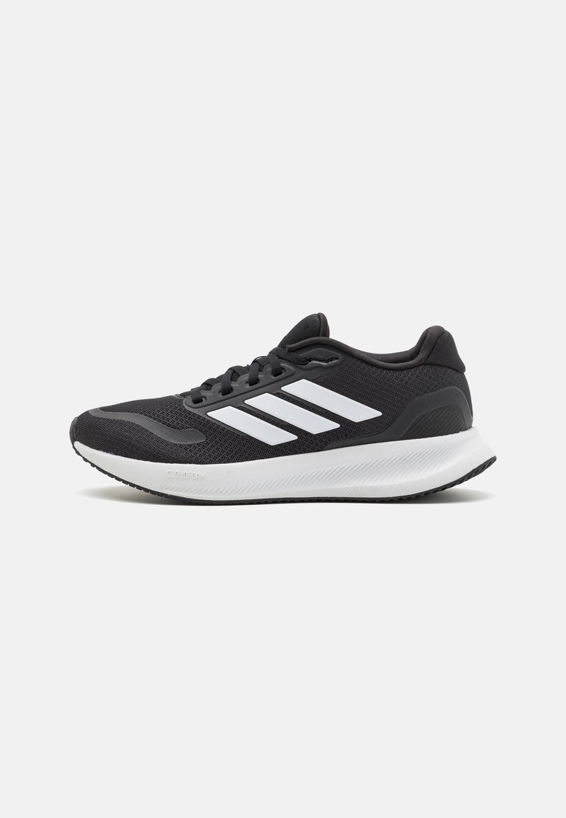 Black athletic shoe featuring mesh upper, round toe, and three white stripes on the side. Lightweight sole with textured rubber outsole for grip.